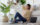 Young woman relaxing on the floor of her living room